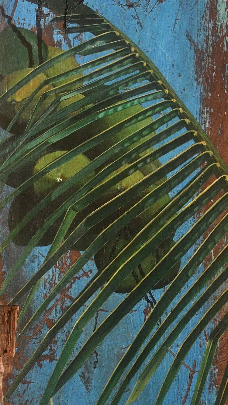 Art in Wood: 8 Ideas, From Knot Jewelry to Totem Pillars 4 Painting of green coconuts and palm leaves on a weathered blue wooden board