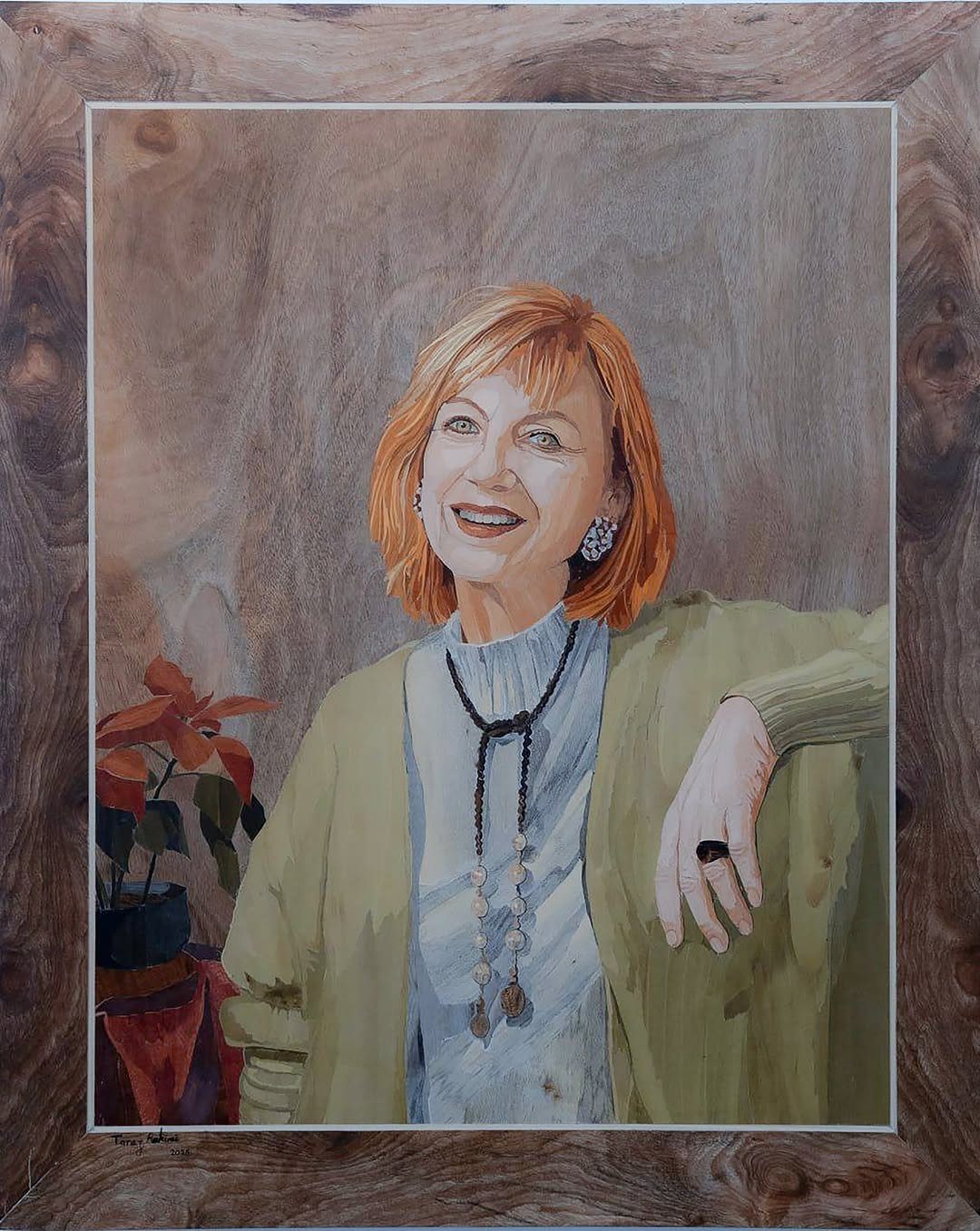 Art in Wood: 8 Ideas, From Knot Jewelry to Totem Pillars 5 Portrait of a red-haired woman painted on a natural wood grain panel.