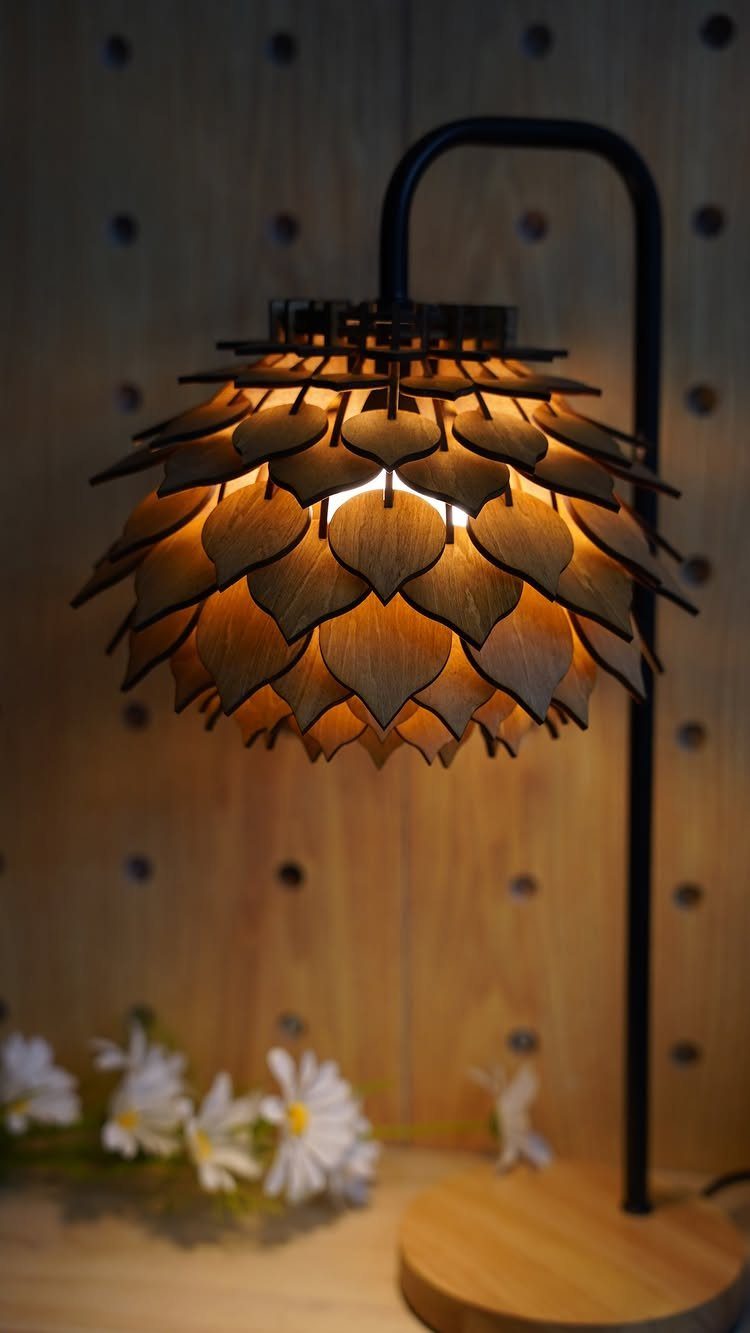 Creative Wood Designs: 8 Ideas for Furniture and Decor 4 Wooden desk lamp with a leaf-shaped petal shade and a black metal arm.