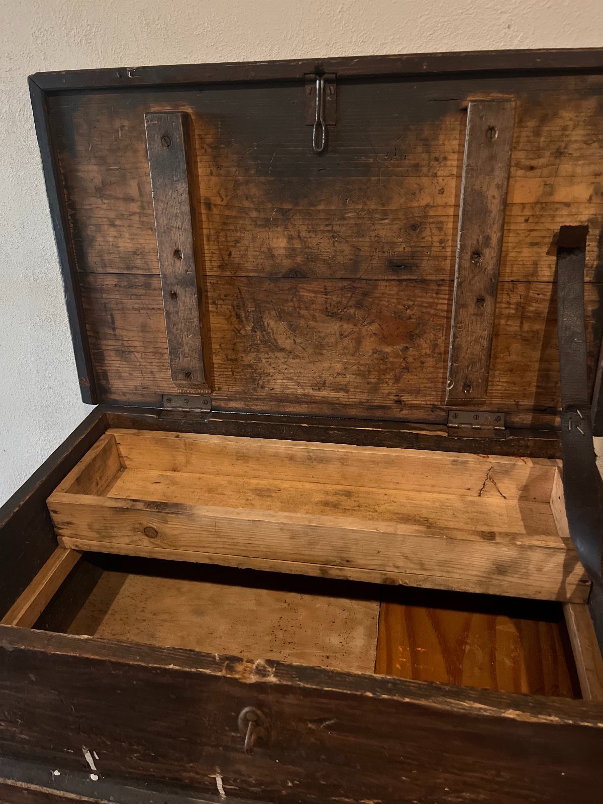 How to Build a DIY Treasure Chest With Wood: 12 Ideas 5 Open dark brown wooden treasure chest with an internal wooden storage tray.