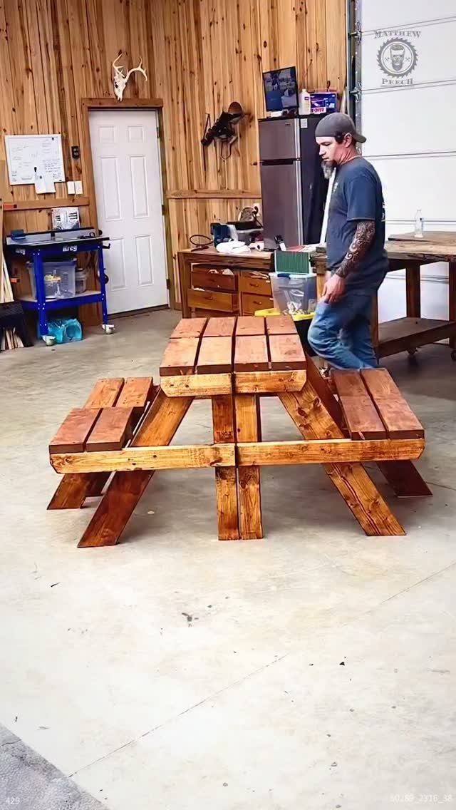 Furniture Plans Free for 16 Tables, Beds and Benches 15 Wooden picnic table with attached benches in a wood-paneled workshop.