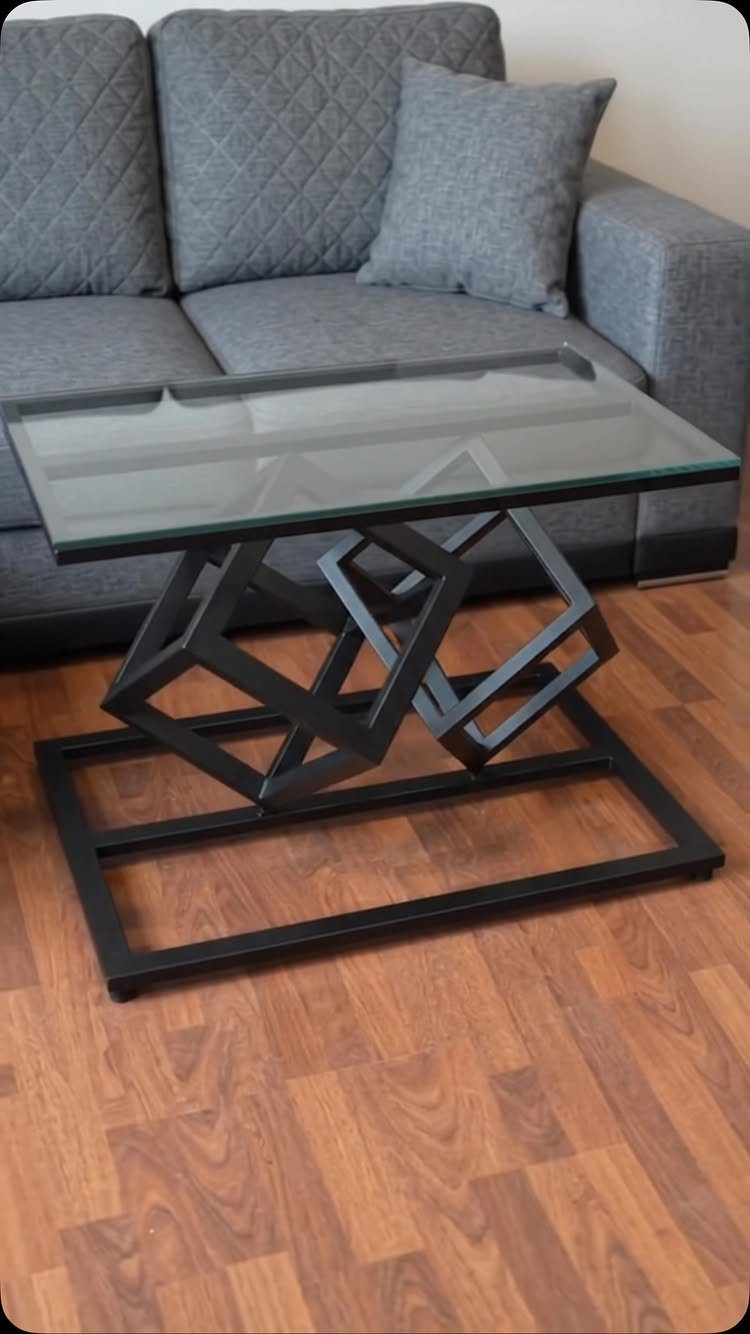 Furniture Plans Free for 16 Tables, Beds and Benches 7 Modern coffee table with glass top and black geometric metal frame base.