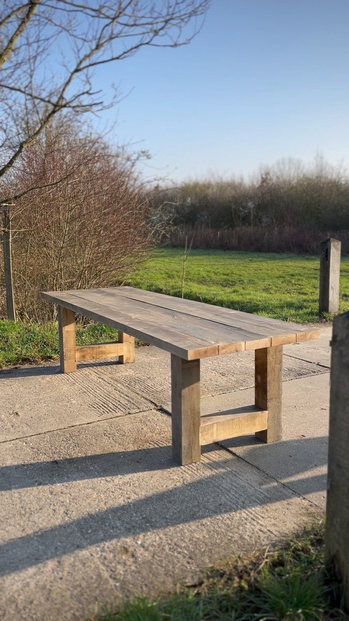 Furniture Plans Free for 16 Tables, Beds and Benches 11 Wooden outdoor table on a concrete patio with a grassy field background