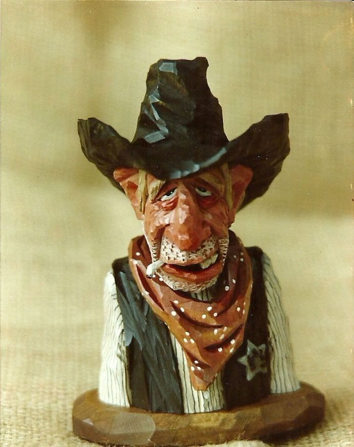 Lynn Doughty Carving: 4 Ideas for Busts and Projects 3 Carved wooden bust of a cowboy with a black hat and red bandana.