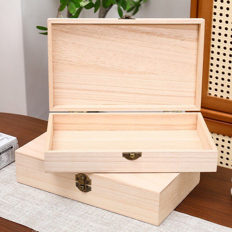 32 Mini Wood Projects for Beginners and Scrap Wood 2 Light natural wood storage boxes with metal clasps on a wooden table.