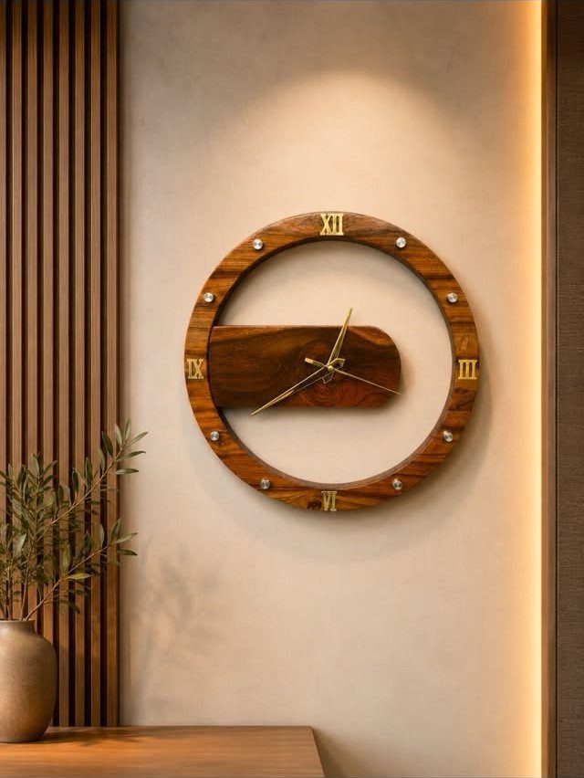 32 Mini Wood Projects for Beginners and Scrap Wood 22 Circular wooden wall clock with gold Roman numerals hanging on a beige wall.