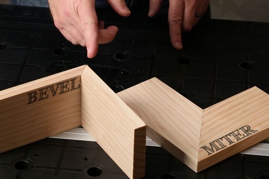 Mitered Corners for Wood: 4 Ideas for Tight Joints 1 Wood samples showing bevel and miter joints on a black workbench
