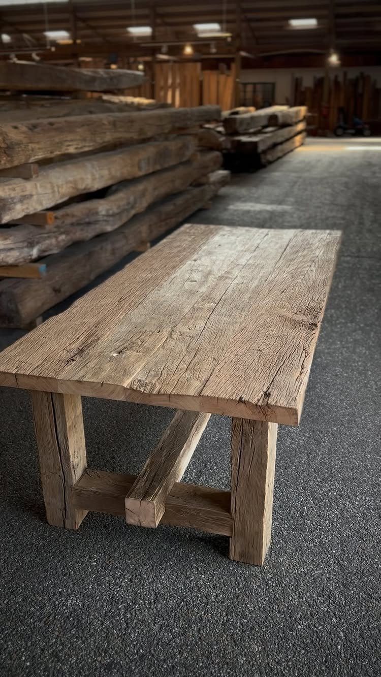 14 Reclaimed Wood Projects for Rustic Home Decor 3 Rustic wooden bench made from reclaimed timber in a warehouse setting