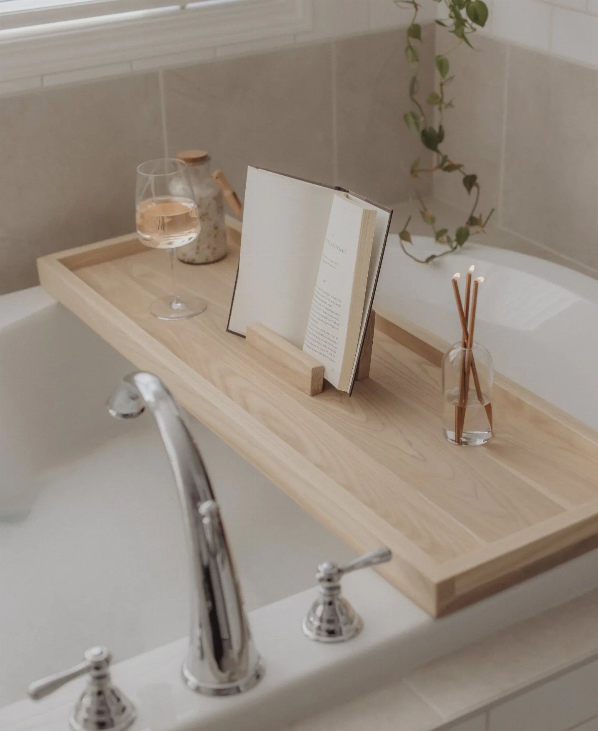 13 Scrap Wood Art Ideas for Using Up Your Leftover Boards 3 Wooden bathtub tray holding a glass of wine, an open book, and incense sticks.