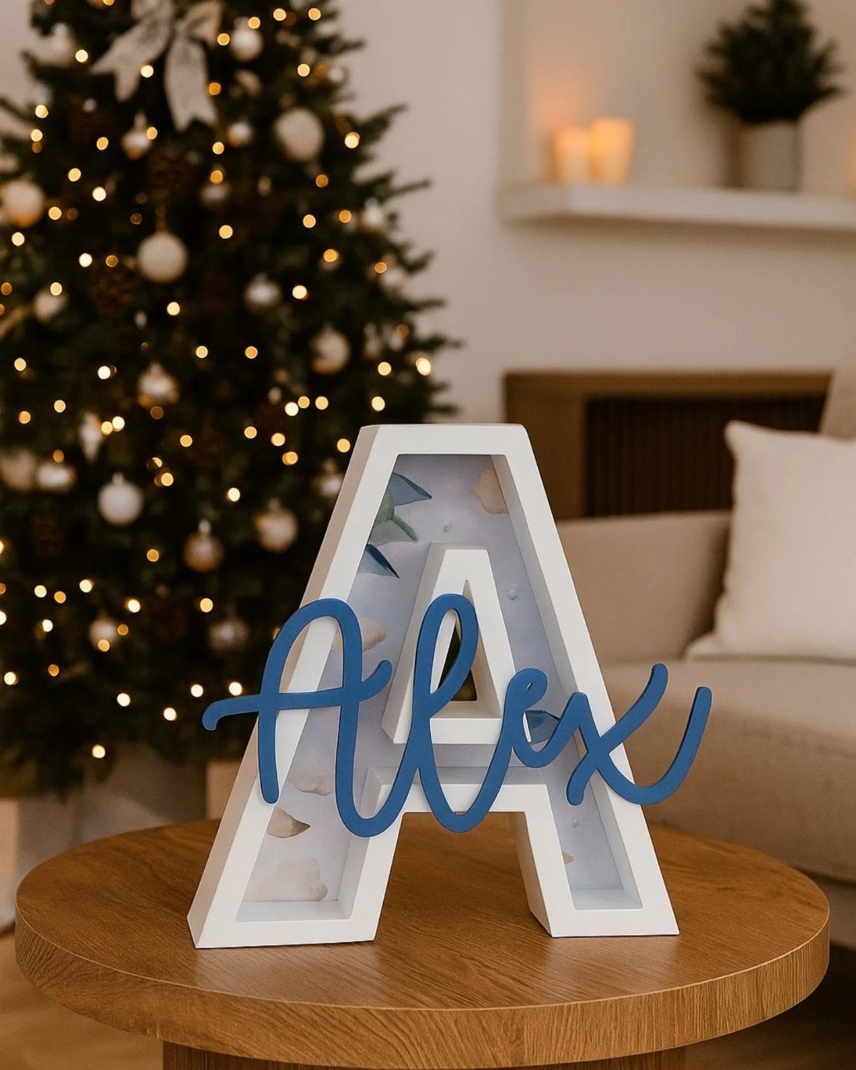 13 Scrap Wood Art Ideas for Using Up Your Leftover Boards 13 White wooden letter A with blue cursive name Alex on a wooden table