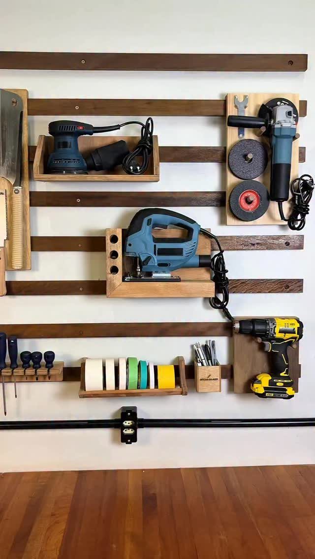 12 Small Workshop Storage Ideas for Tight Spaces 6 French cleat wall system with wooden tool holders and various power tools.