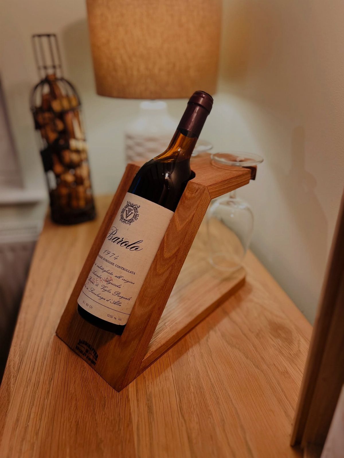 24 Summer Wood Projects for Beginners and Weekend Builders 17 Wooden wine caddy holding a bottle of red wine and a glass on a table