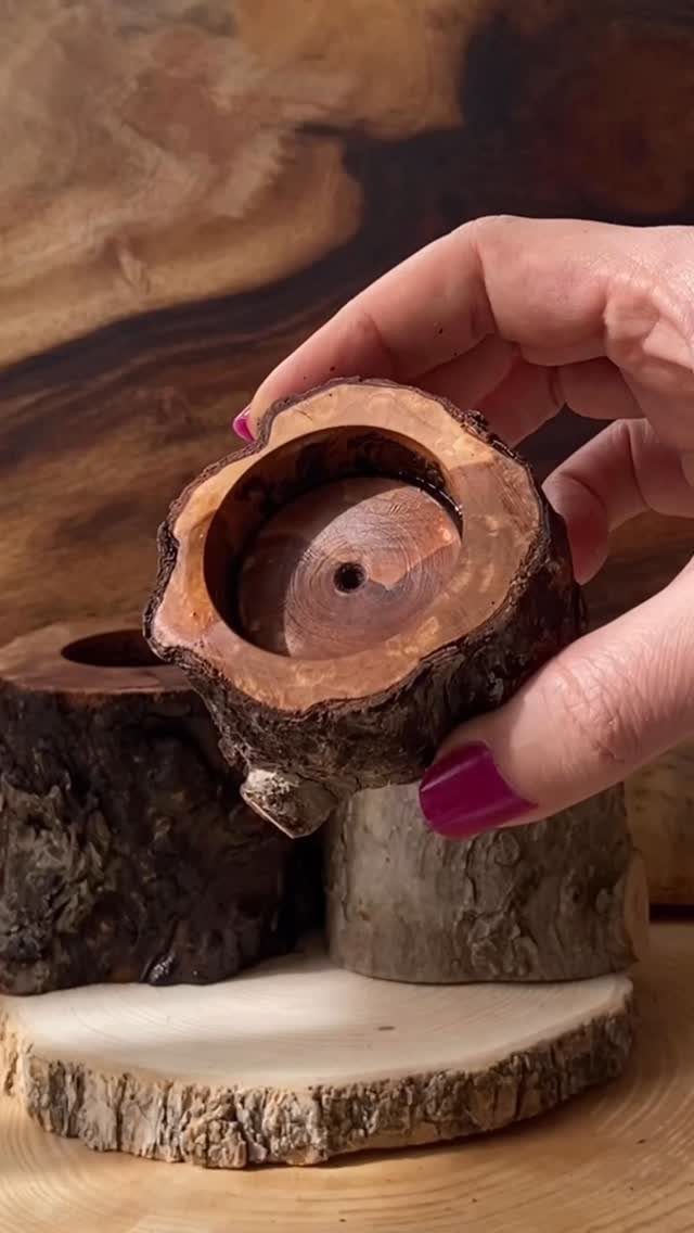 24 Summer Wood Projects for Beginners and Weekend Builders 4 Hand holding a rustic wooden candle holder made from a natural log slice.
