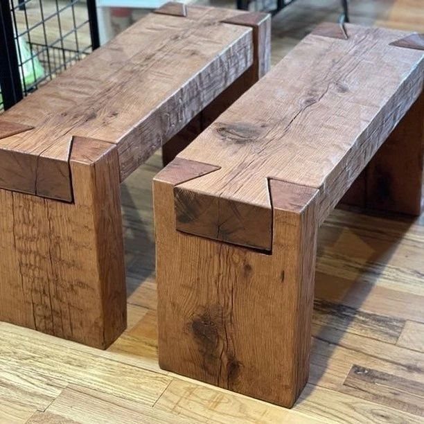 Timber Frame Joinery: 4 Joints and Details to Know 4 Two rustic timber benches showing traditional joinery on a light wooden floor