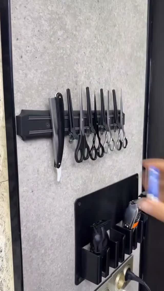 Tool Storage DIY Ideas: 7 Projects for Any Garage 2 Magnetic tool holder on a grey wall holding scissors and a utility knife