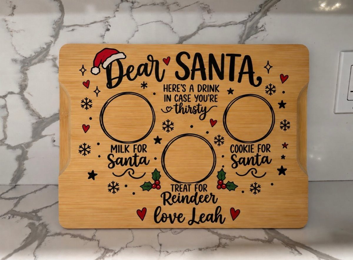 Wood burned treat tray for Santa with festive holiday designs and personalized text.