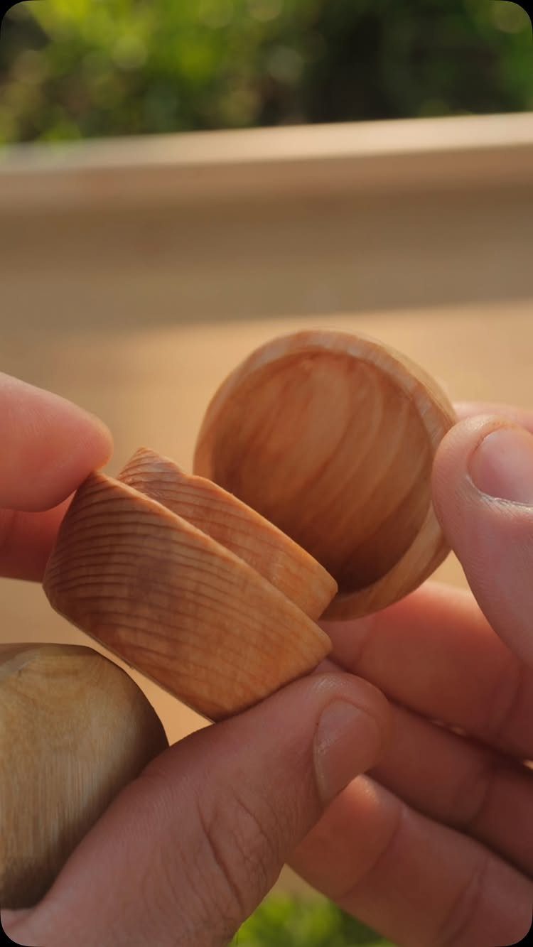 Wood Carving for Beginners: 10 Ideas to Try First 5 Hand-carved small wooden container with lid held in a person's hands outdoors.
