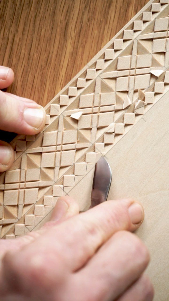 Wood Carving for Beginners: 10 Ideas to Try First 7 Hands using a carving knife to create geometric patterns in light wood.