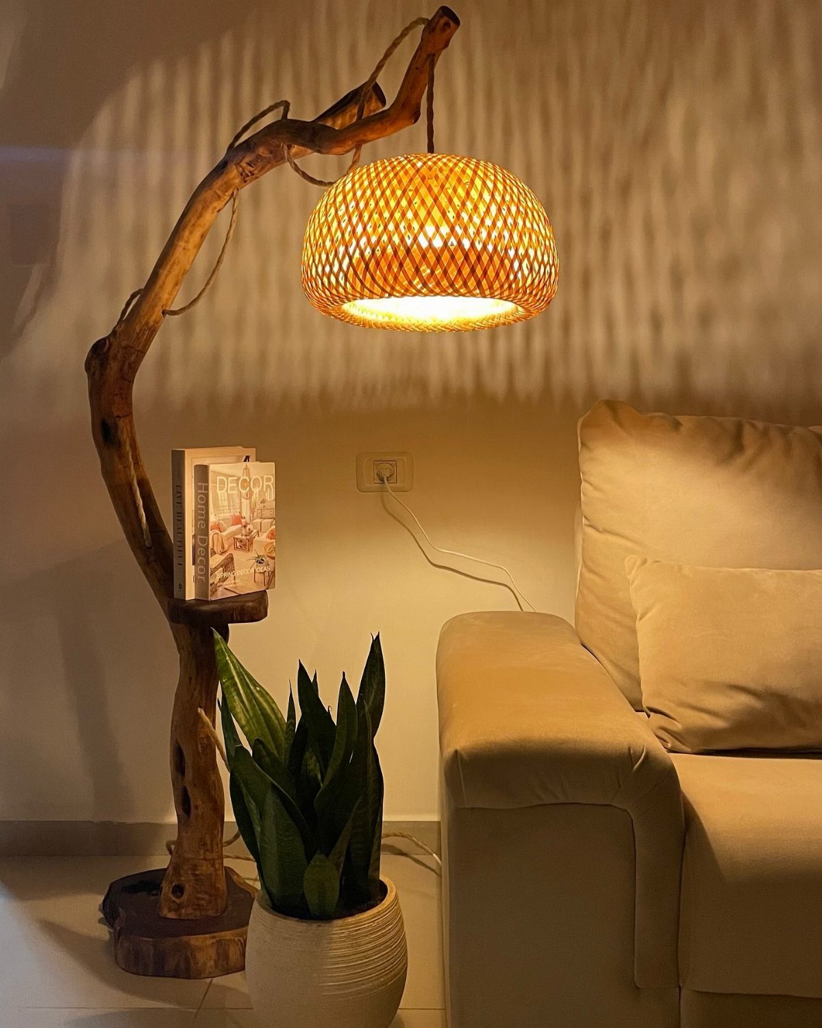Wood Lamp Design: 14 Table, Floor and Pendant Ideas 5 Curved tree branch floor lamp with a woven wicker shade beside a beige sofa