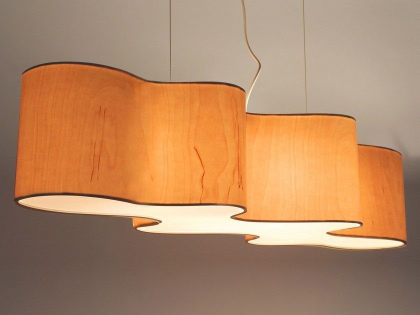 Wood Lamp Design: 14 Table, Floor and Pendant Ideas 3 Curved wooden ceiling lamp with a wavy cloud shape emitting warm light.