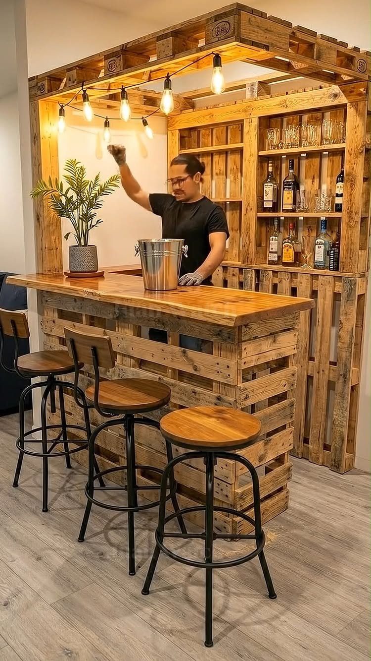 17 Wood Pallet Projects for Furniture, Decor, and Garden 11 Wooden pallet bar with shelving, liquor bottles, and three matching bar stools.