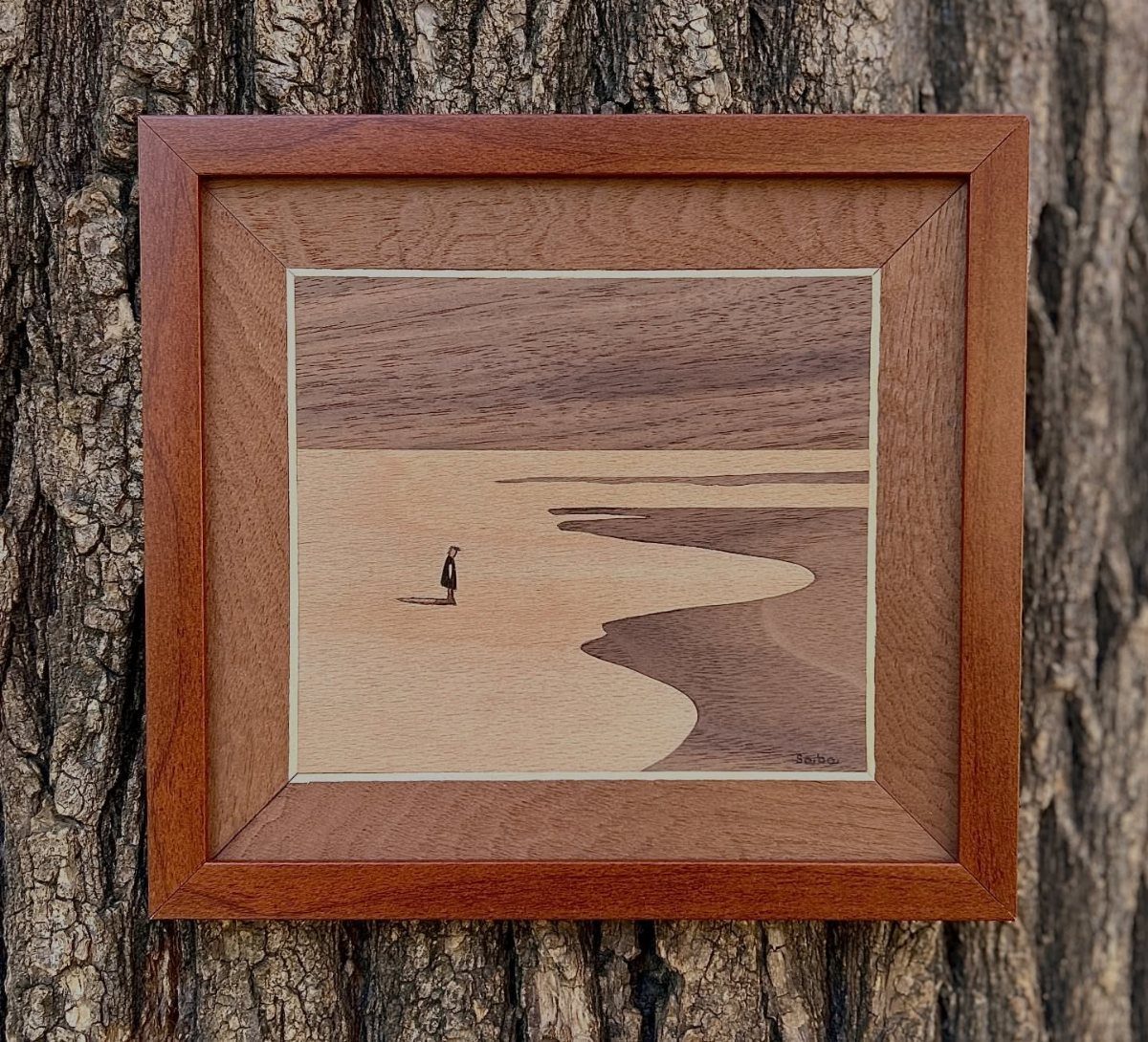 Wood Piece Art Ideas: 25 Designs for Walls and Shelves 21 Wood landscape art depicting a lone figure on a beach in a wooden frame.