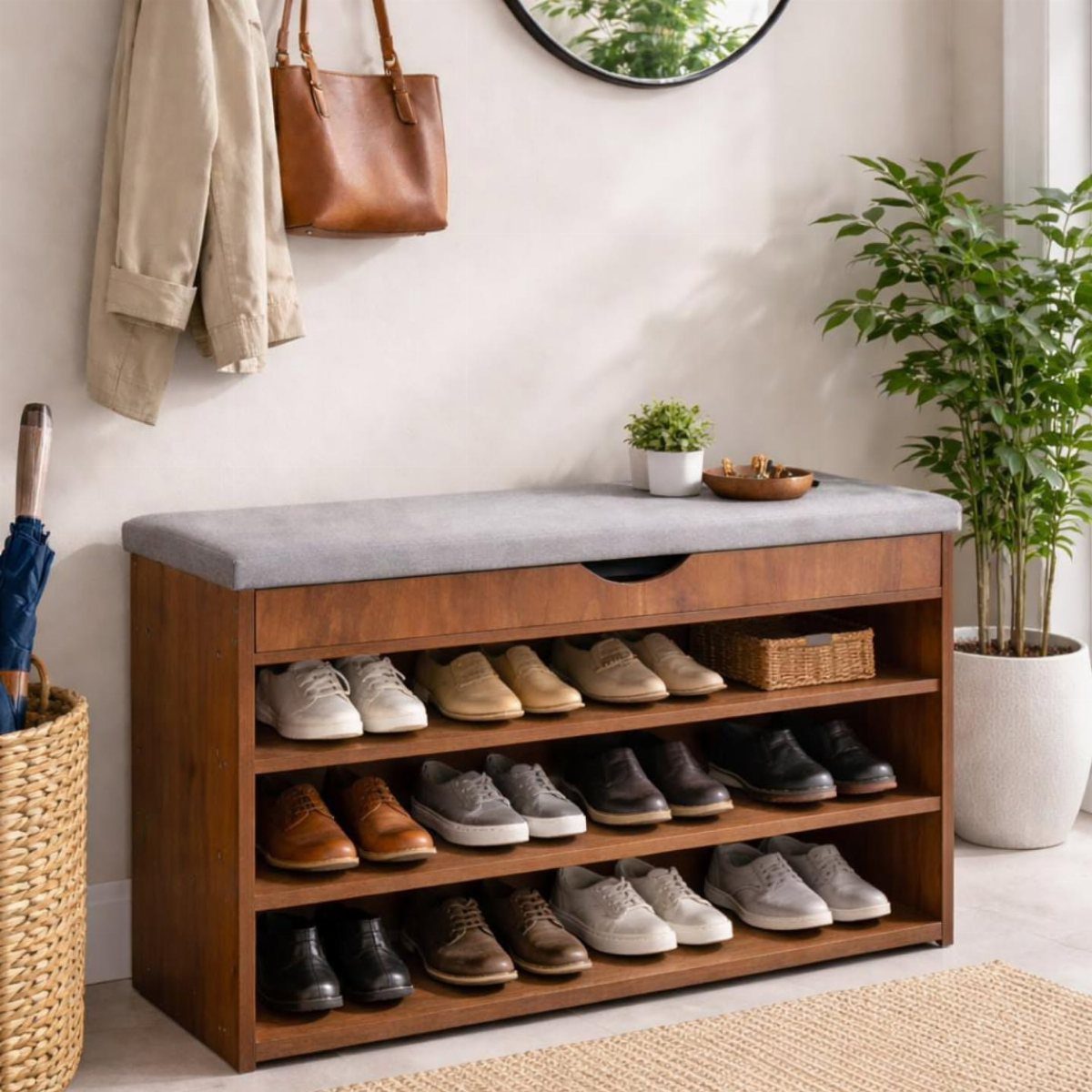 Wooden entryway bench with grey cushion, storage drawer, and three shoe shelves.