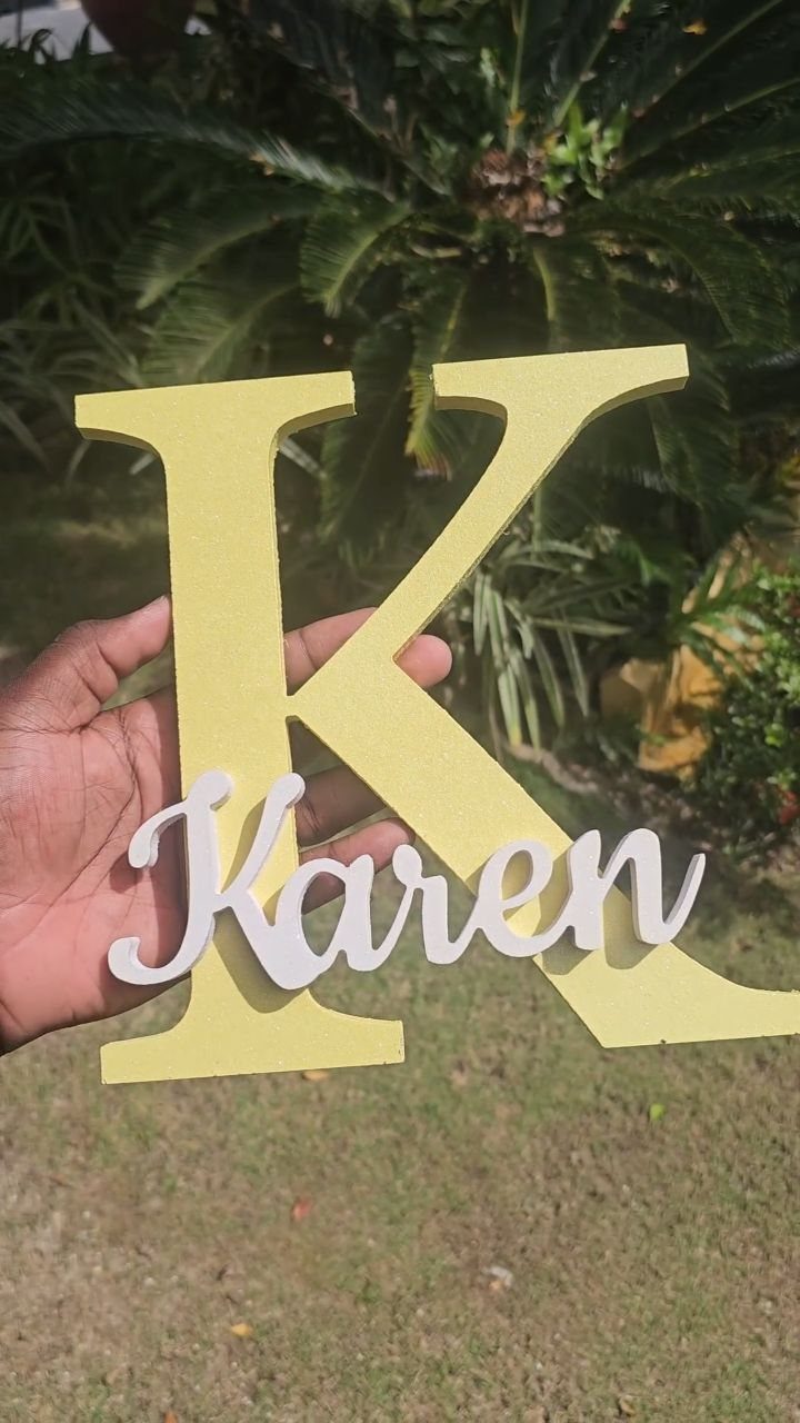 Yellow wooden letter K with the name Karen in white cursive script.