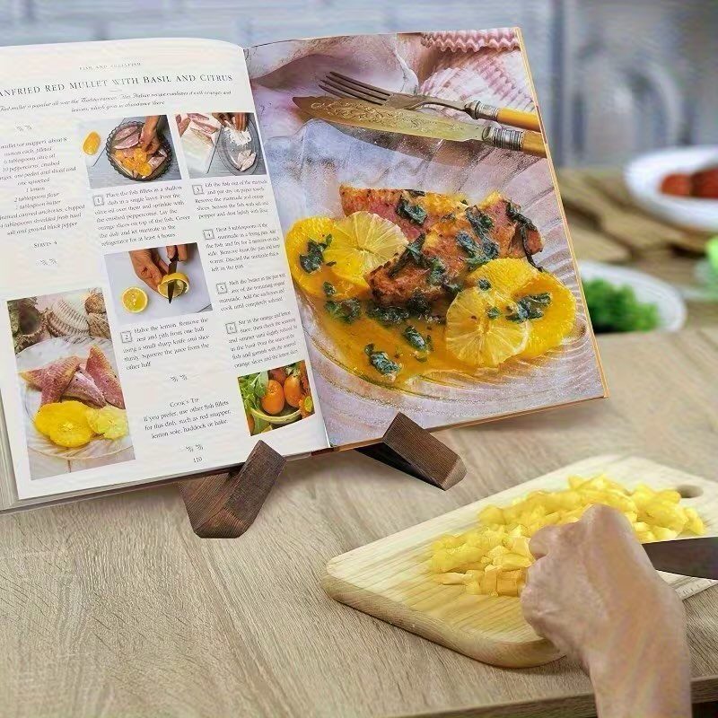 Woodworking Book Holder Ideas: 4 Designs to Build 3 Wooden book holder supporting an open cookbook on a kitchen table.