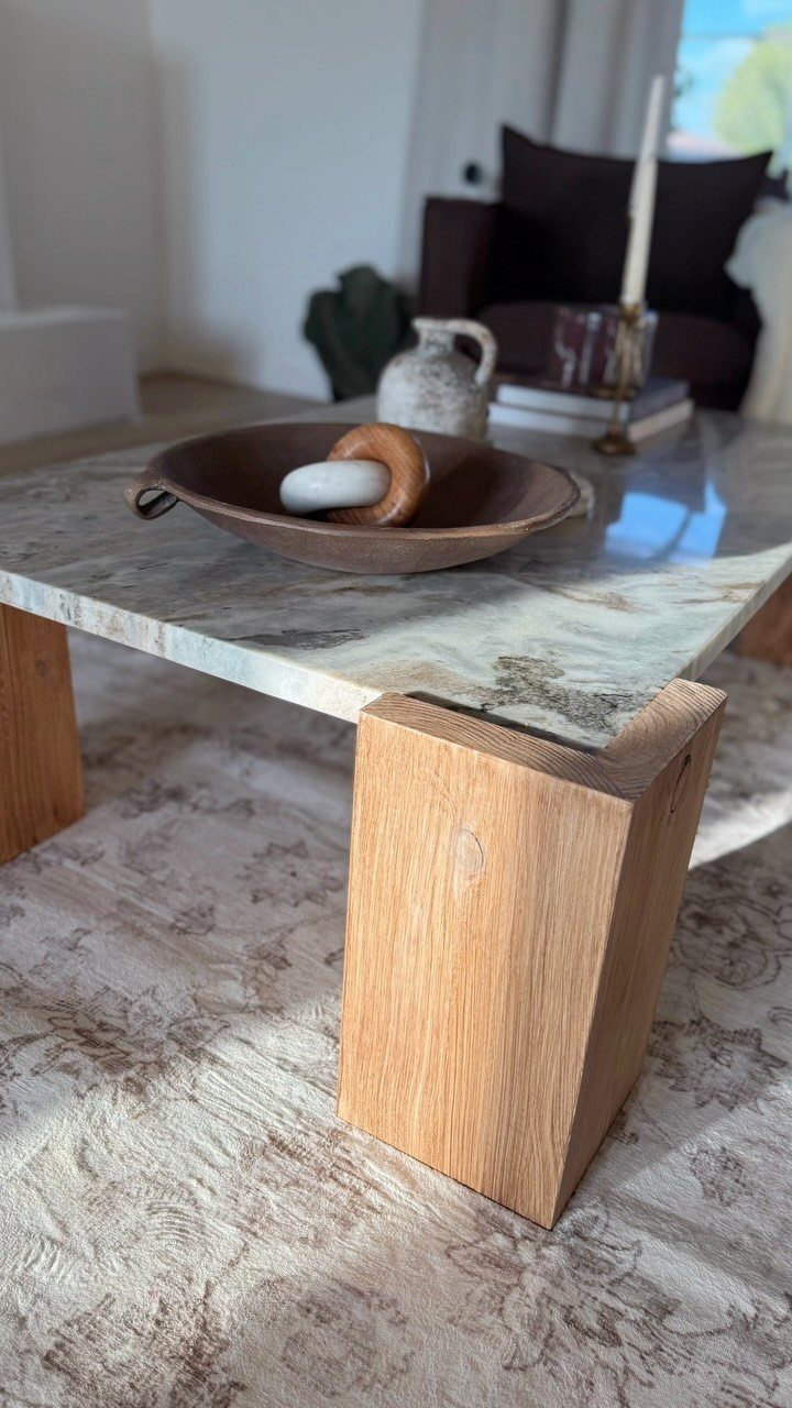 9 Woodworking Coffee Table Ideas for Every Skill Level 5 Coffee table with a marbled stone top and thick wooden block legs