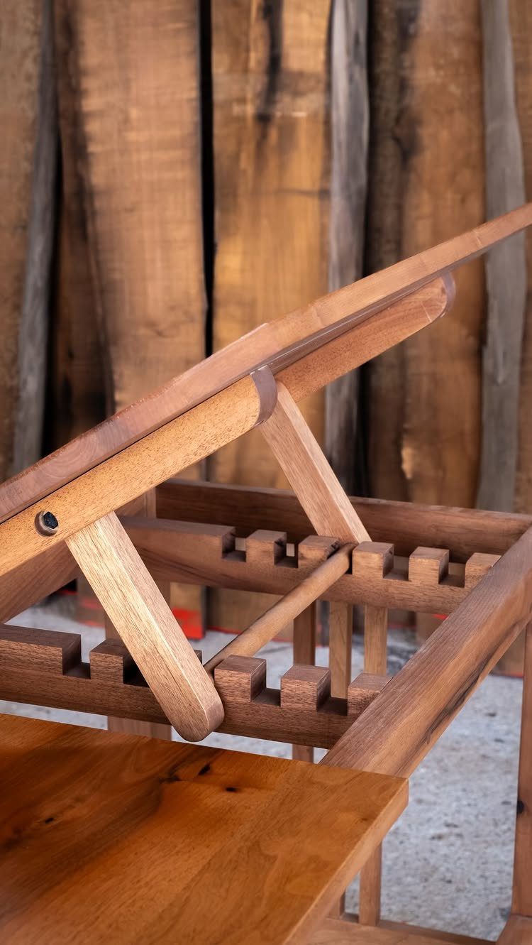 14 Woodworking Ideas to Make Money From Your Shop 11 Handcrafted wooden wine rack with a tilting top and polished brown finish.